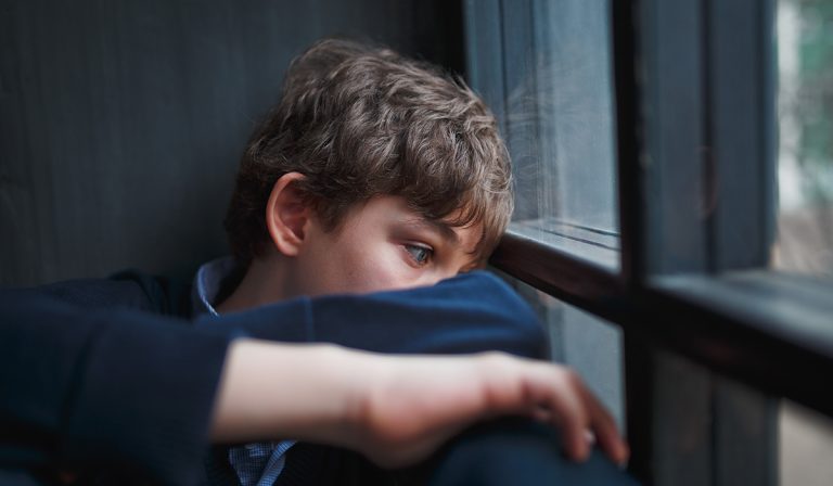 grieving boy