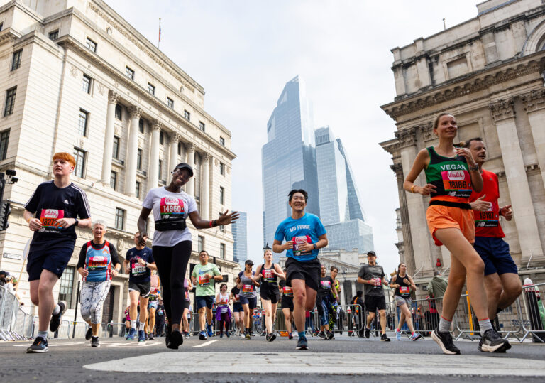 Participants run through Bank during The Vitality London 10,000.
